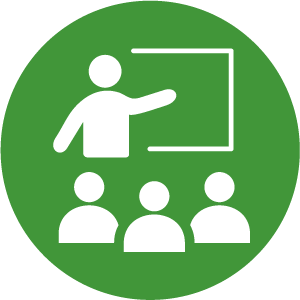 Icon of a person pointing to a chalkboard while three other people look on