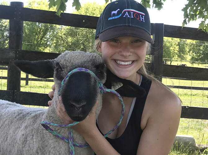 Irene Nielsen and a sheep