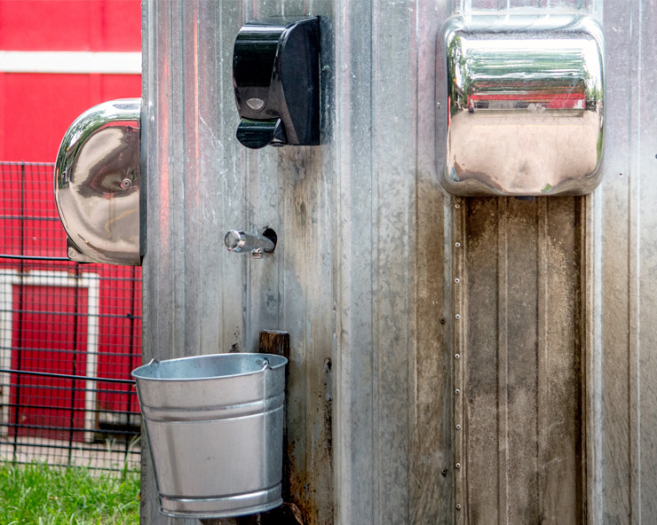 handwashing station attached to the side of the barn